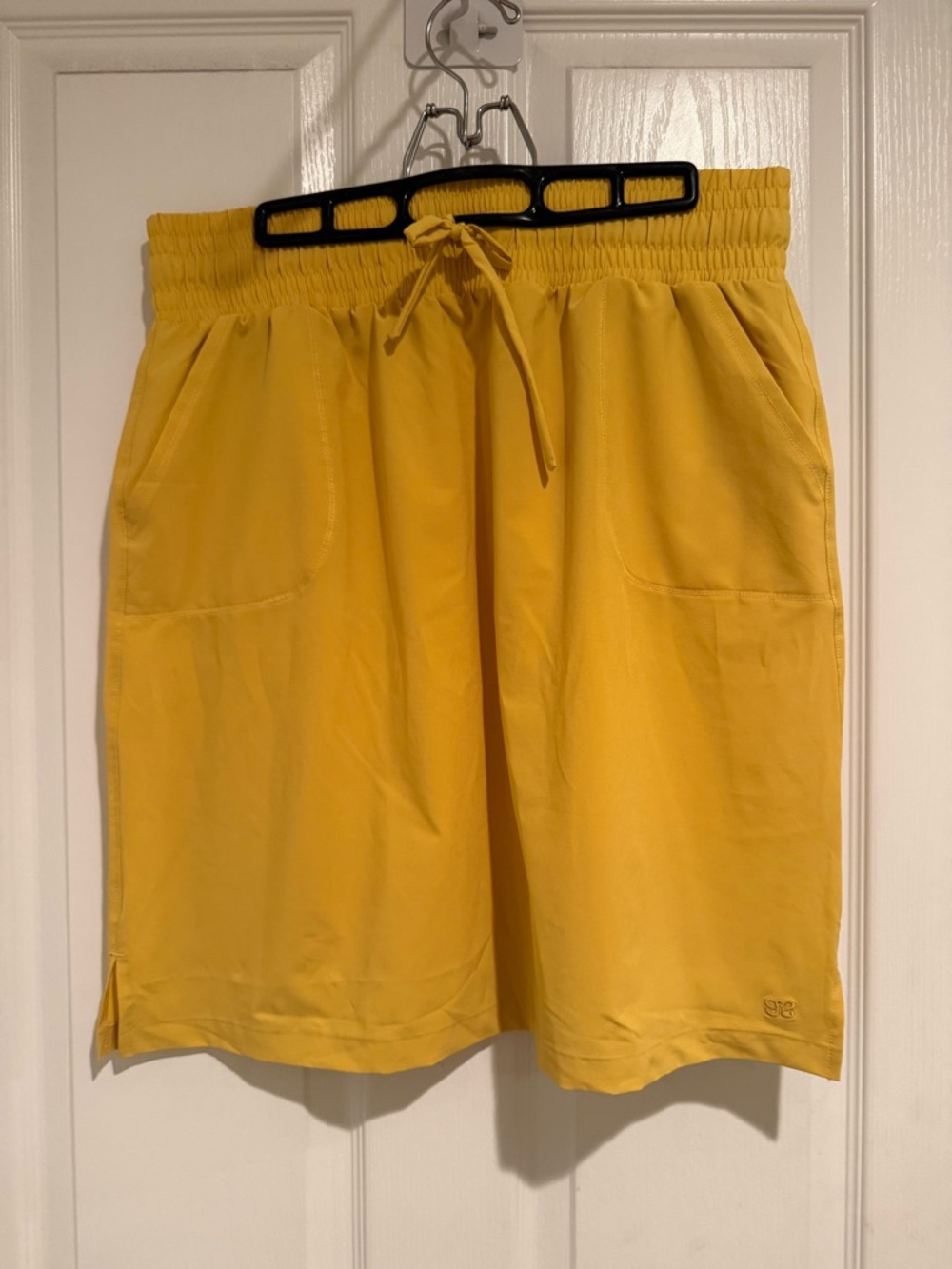 Albion Yellow Activewear skirt with Branded Interior Print